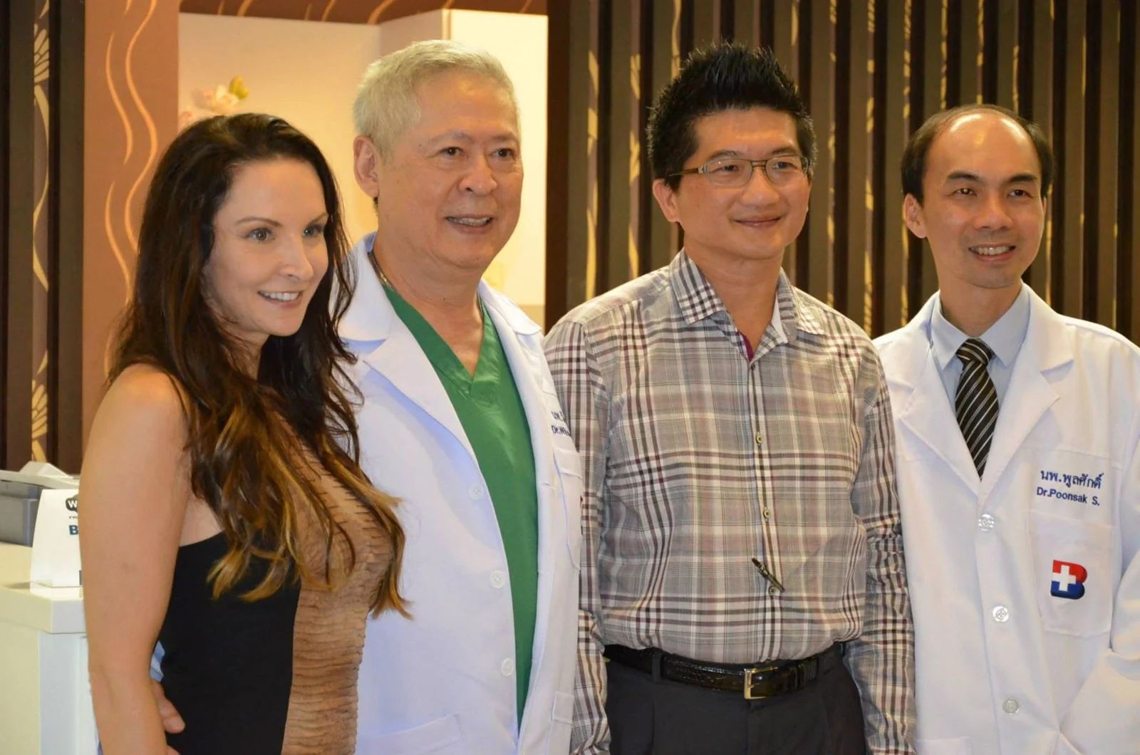 Claire with three of her partner surgeons