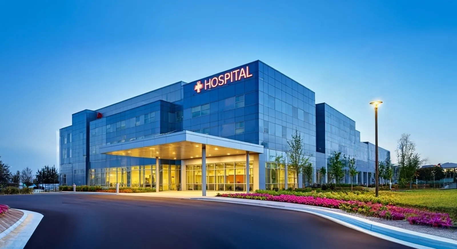 A modern hospital entrance at dusk